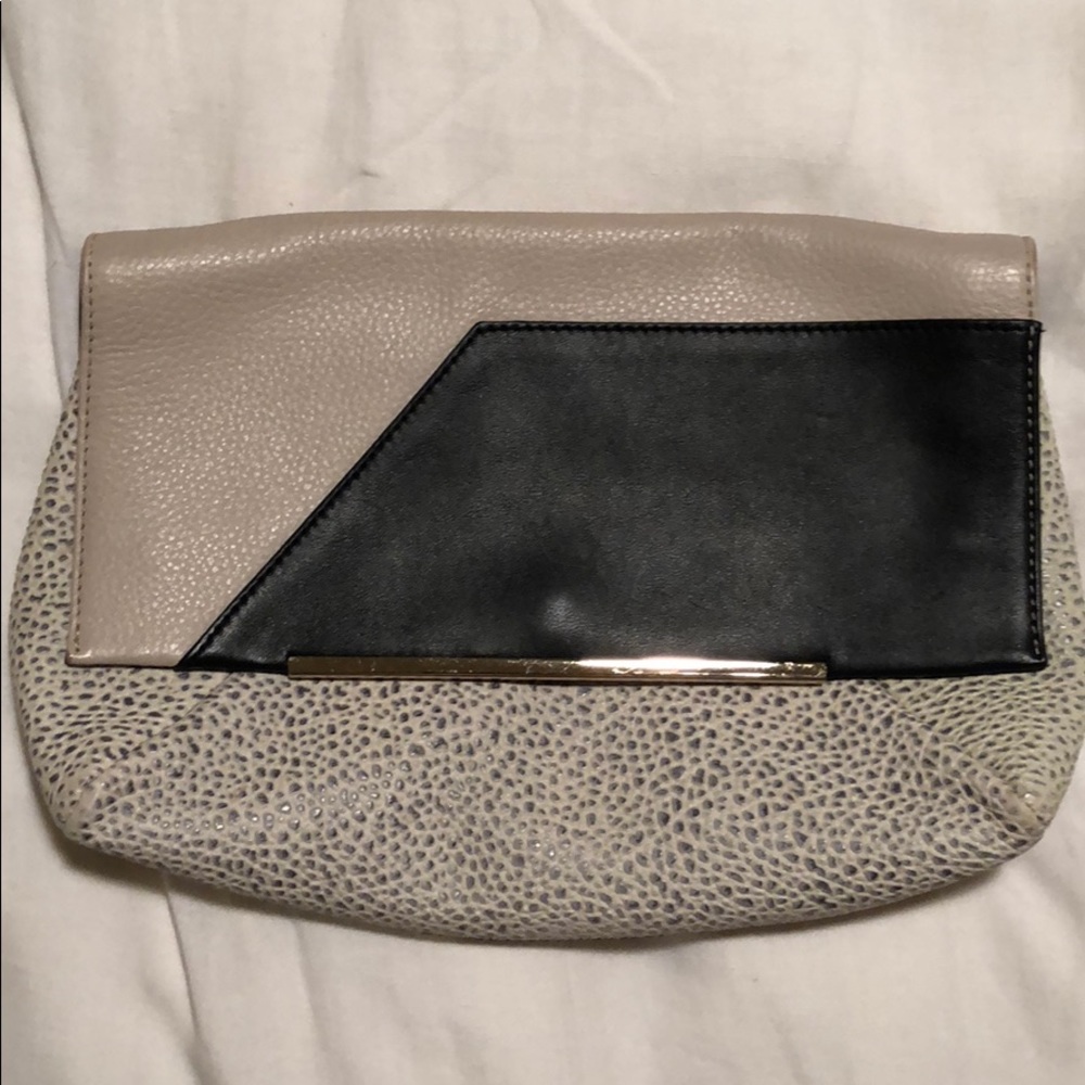 Pour La Victoire Clutch sling purse
